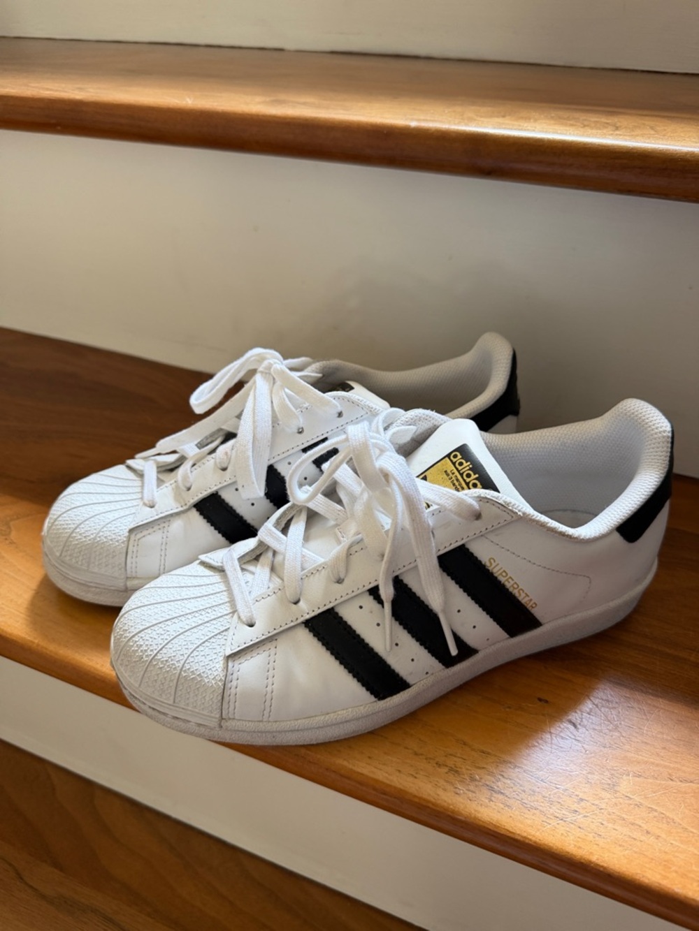 adidas Women’s White and Black Superstar Sneakers